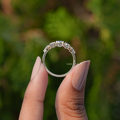 Back View of Round Cut Lab Grown Diamond Five Stone Ring In two fingers