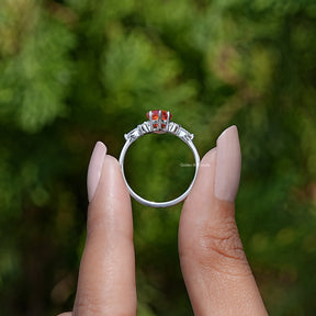 Back View of Kite Cut Gemstone Accent Ring In two fingers