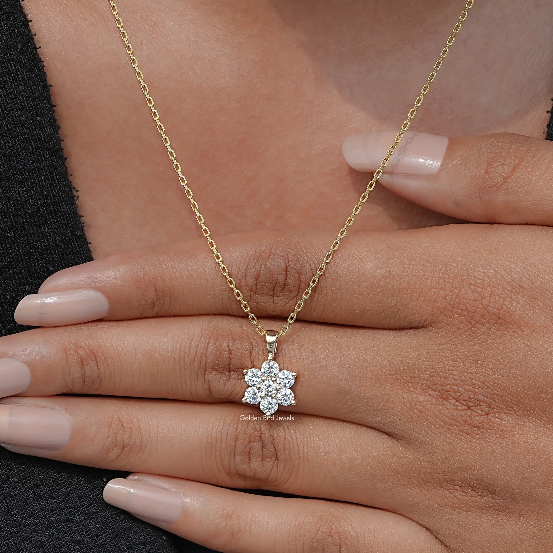 Close-Up View of Round Cut Floral Minimalist Pendant In Yellow Gold