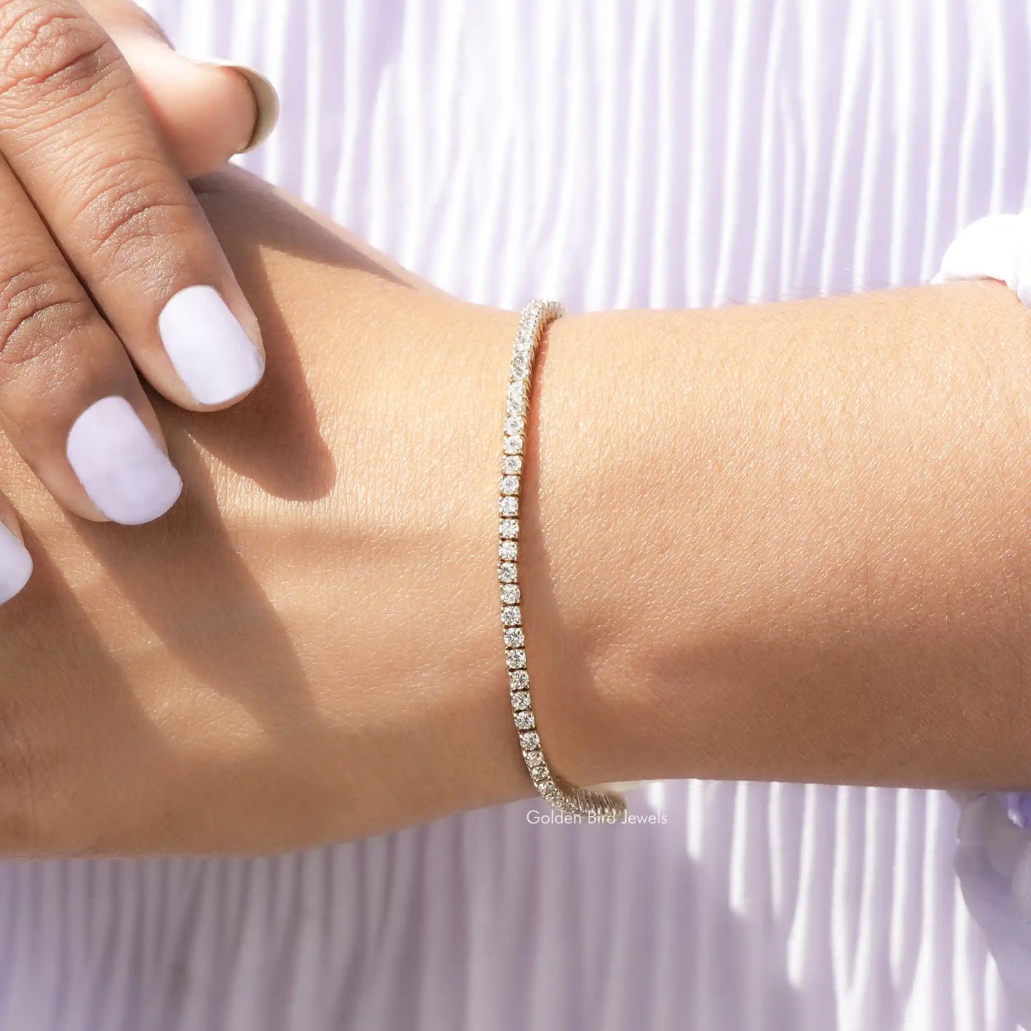 In Hand Showing View Of LGD Round Cut Tennis Bracelet