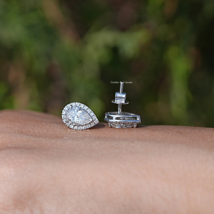 Front And Back Side View Of Solitaire Stud Earrings In Women's