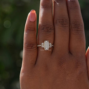 Detailed View Of Emerald Cut Moissanite Engagement Ring In Yellow Gold