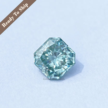 Green square radiant-cut moissanite gemstone with radiant faceted design