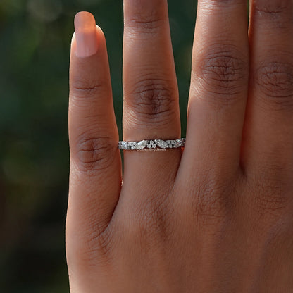 Top View Of Marquise And Round shaped diamond engagement ring 
