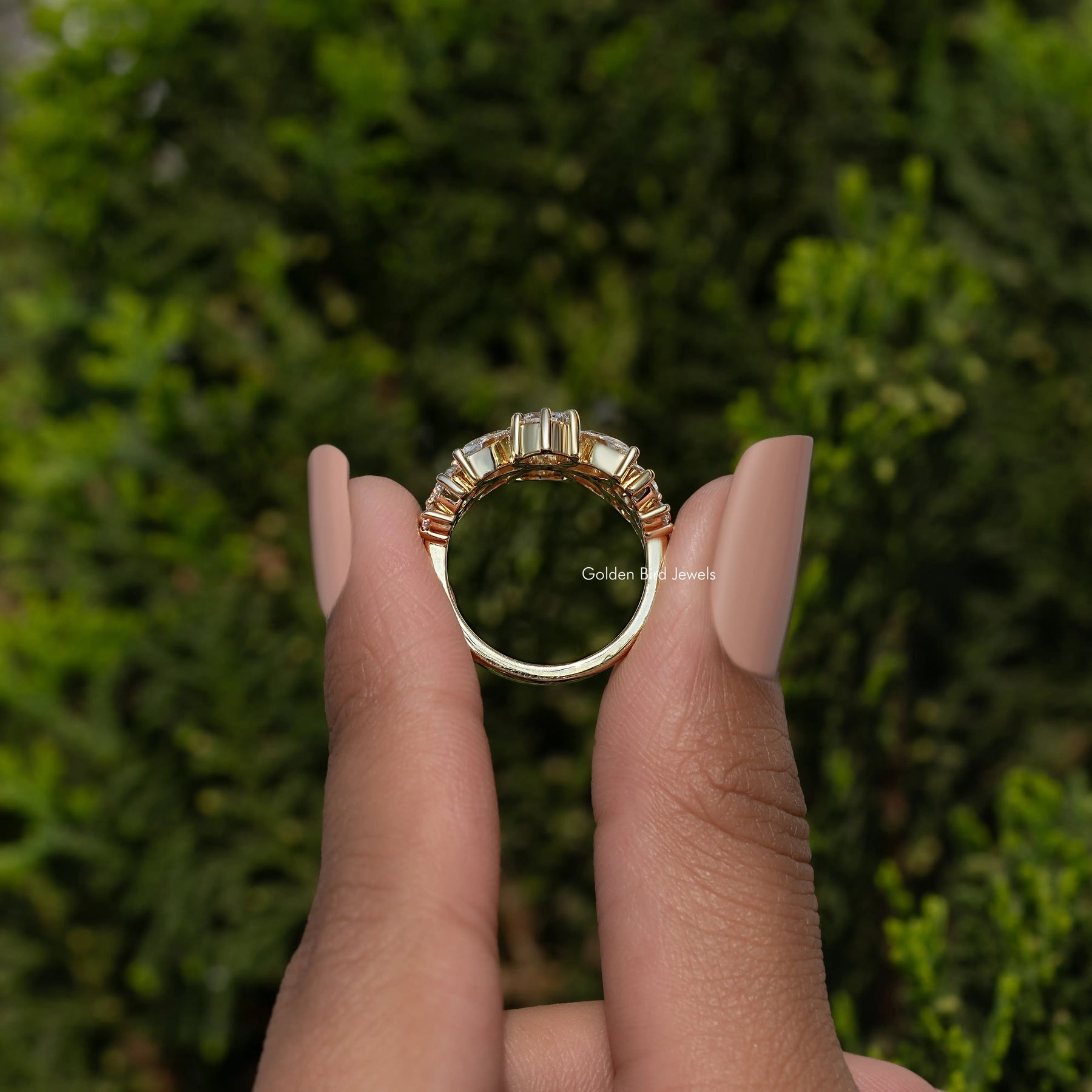 Vintage-Ring mit Moissanit im Marquise- und Rundschliff