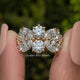 Vintage-Ring mit Moissanit im Marquise- und Rundschliff