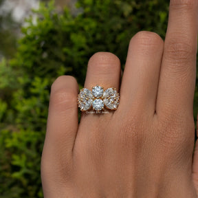 Vintage-Ring mit Moissanit im Marquise- und Rundschliff