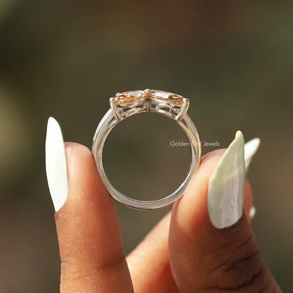 Back View of Marquise Cut Moissanite Engagement Ring In two fingers