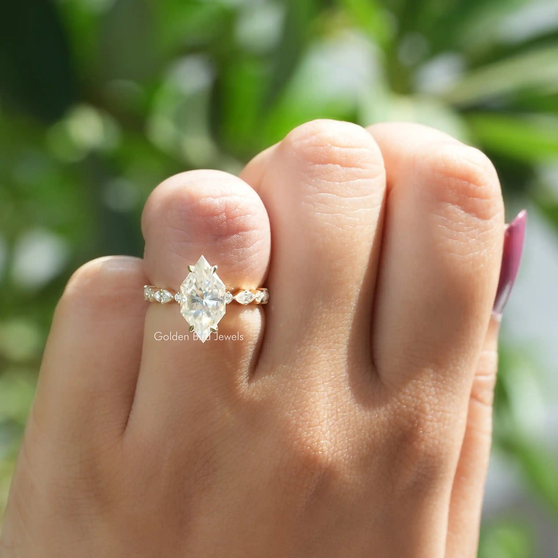 [In finger front view of marquise cutt engagement ring made of 14k yellow gold]-[Golden Bird Jewels]