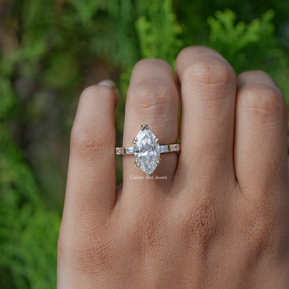 In finger front view of  Marquise And Baguette Cut Moissanite Solitaire Accent Ring 
