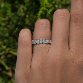 In finger view of Bezel Set Radiant Cut Full Eternity Band