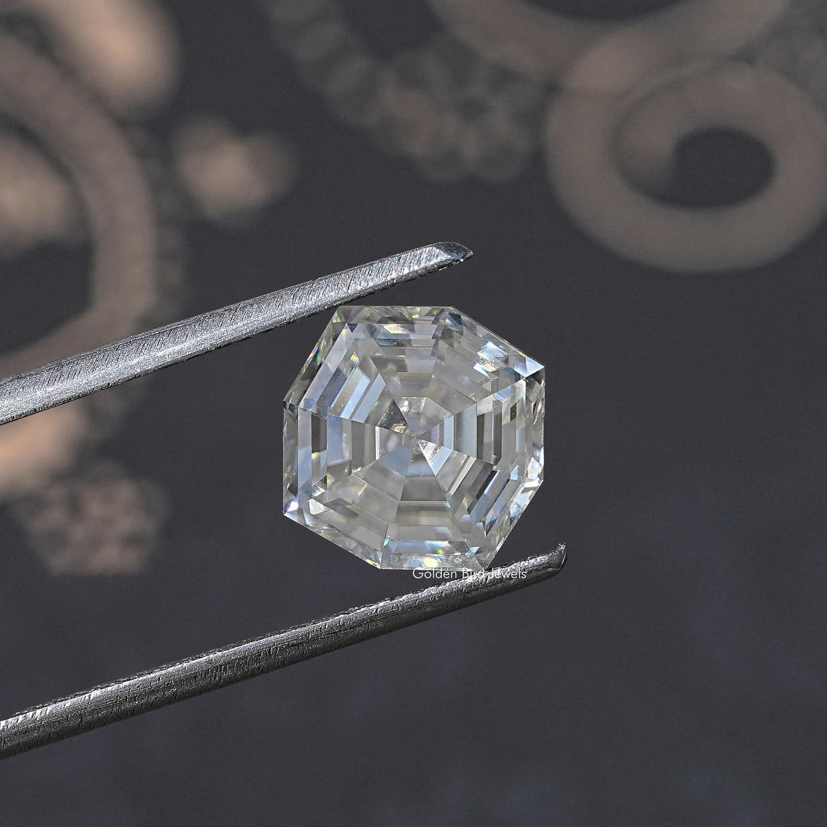 Colorless cushion-cut moissanite loose gemstone held by metal tweezers, side view.