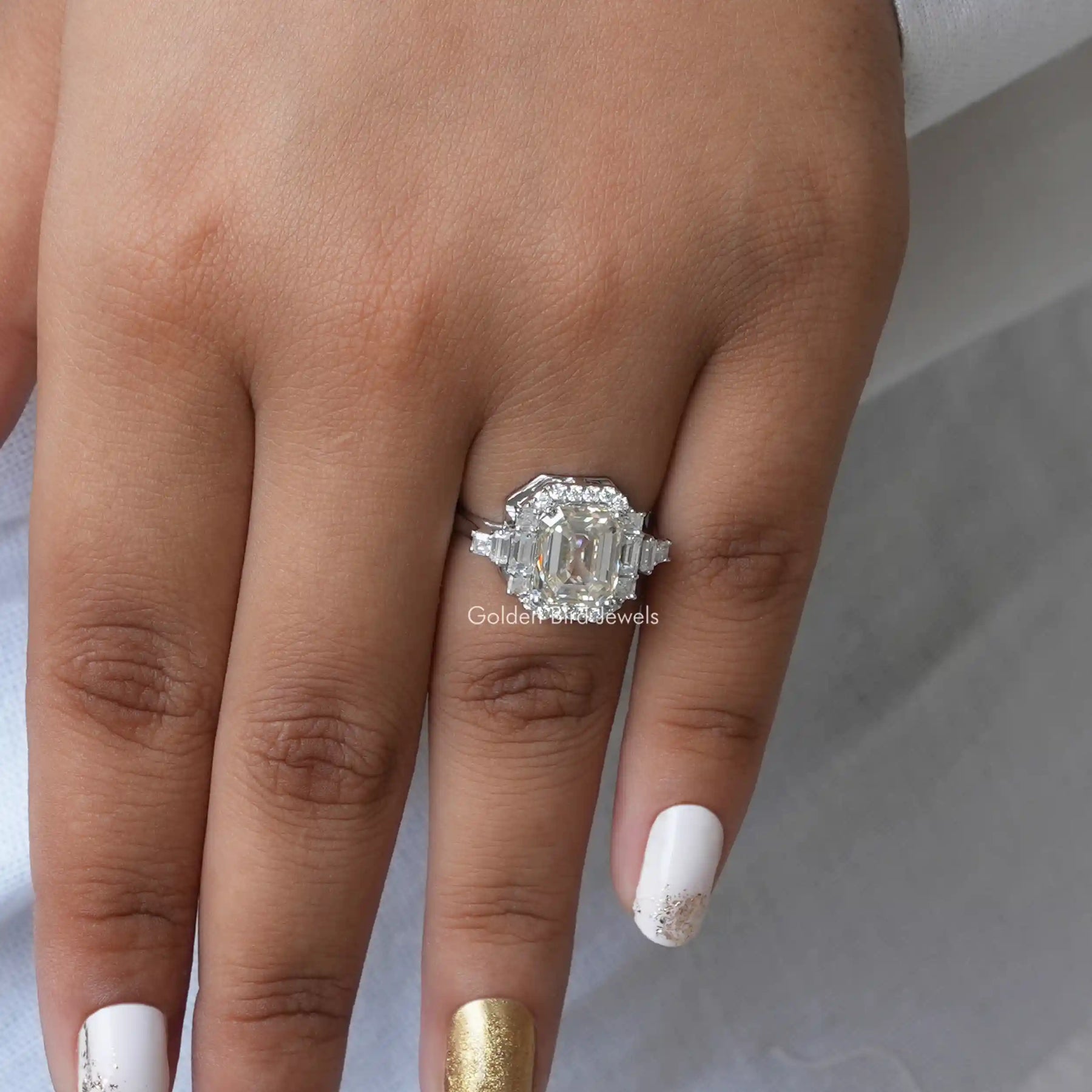 View of Asscher And Round Cut Halo Engagement Ring In finger