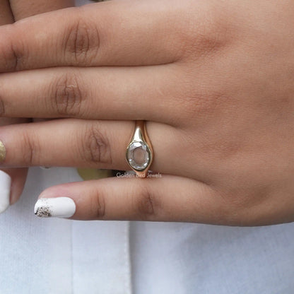 View of Oval Cut Moissanite Engagement Ring In Yellow Gold