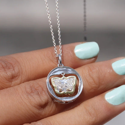 In hand showing view of moissanite pendant	 		