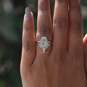 View of Coffin Cut Moissanite Halo Bridal Ring Set In finger