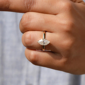 View of Colorless Marquise Cut Solitaire Engagement Ring In Yellow Gold