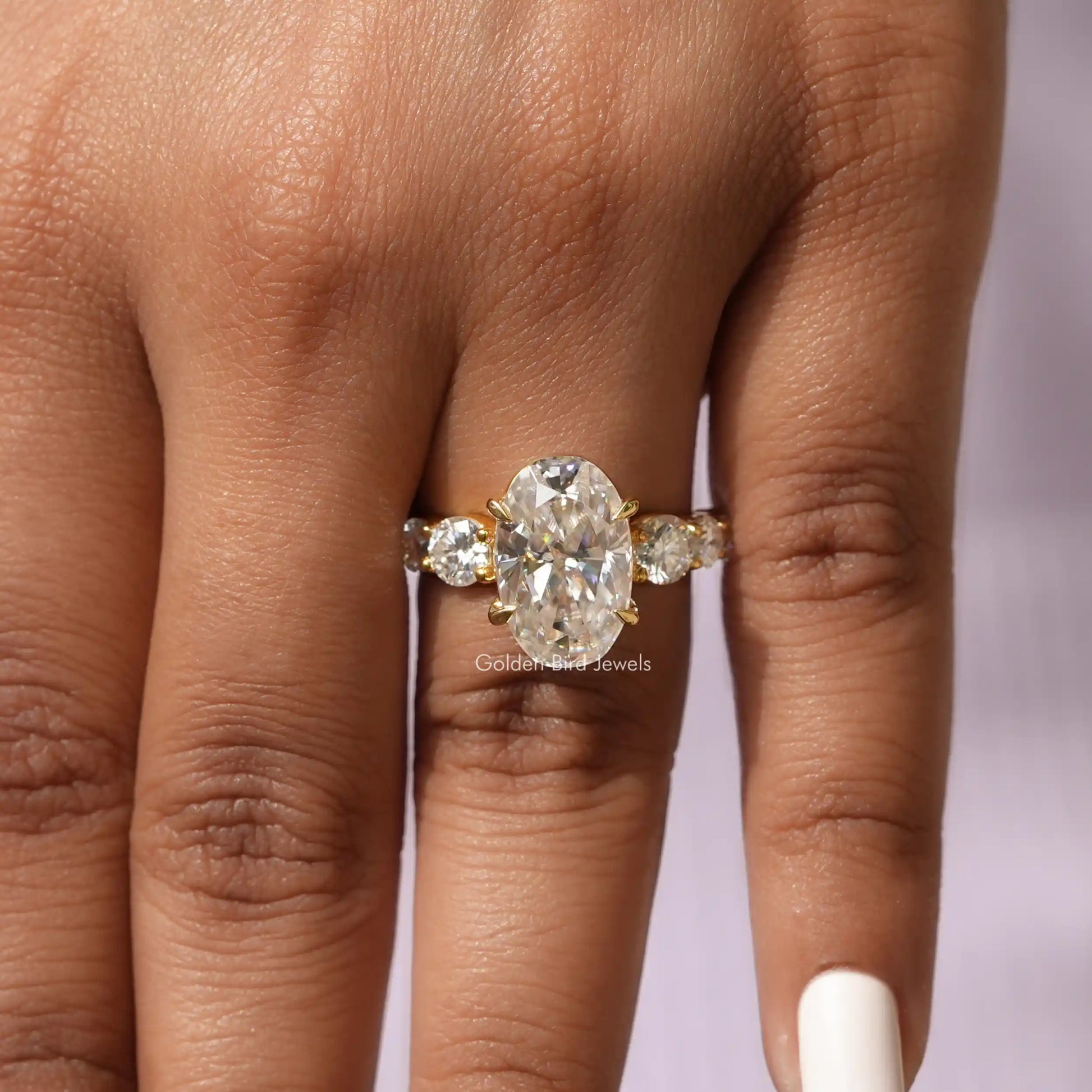 Oval And Round Cut Moissanite Ring In finger