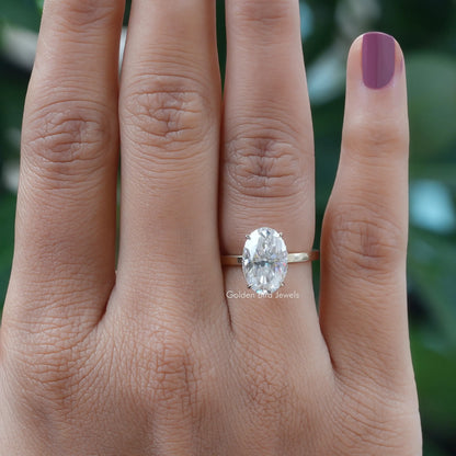 View of Crushed Ice Oval Solitaire Hidden Halo Ring In Yellow Gold