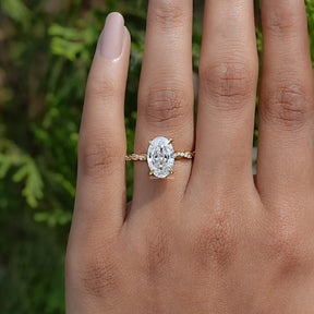 Detailed View Of Crushed Ice Oval Twist Shank Ring In Yellow Gold