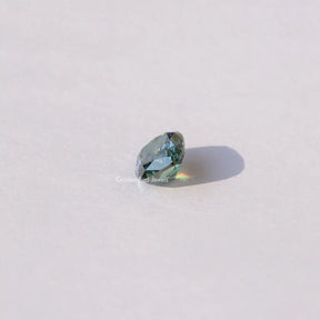 [Top view of moissanite blue green cushion cut loose moissanite]