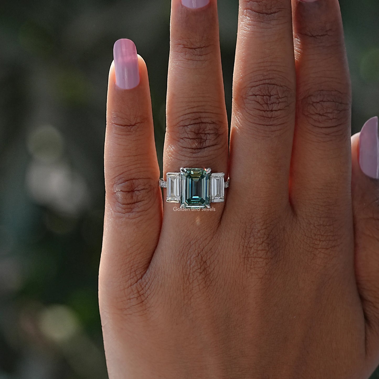Detailed View Of Blue Green Emerald Cut 3 Stone Ring