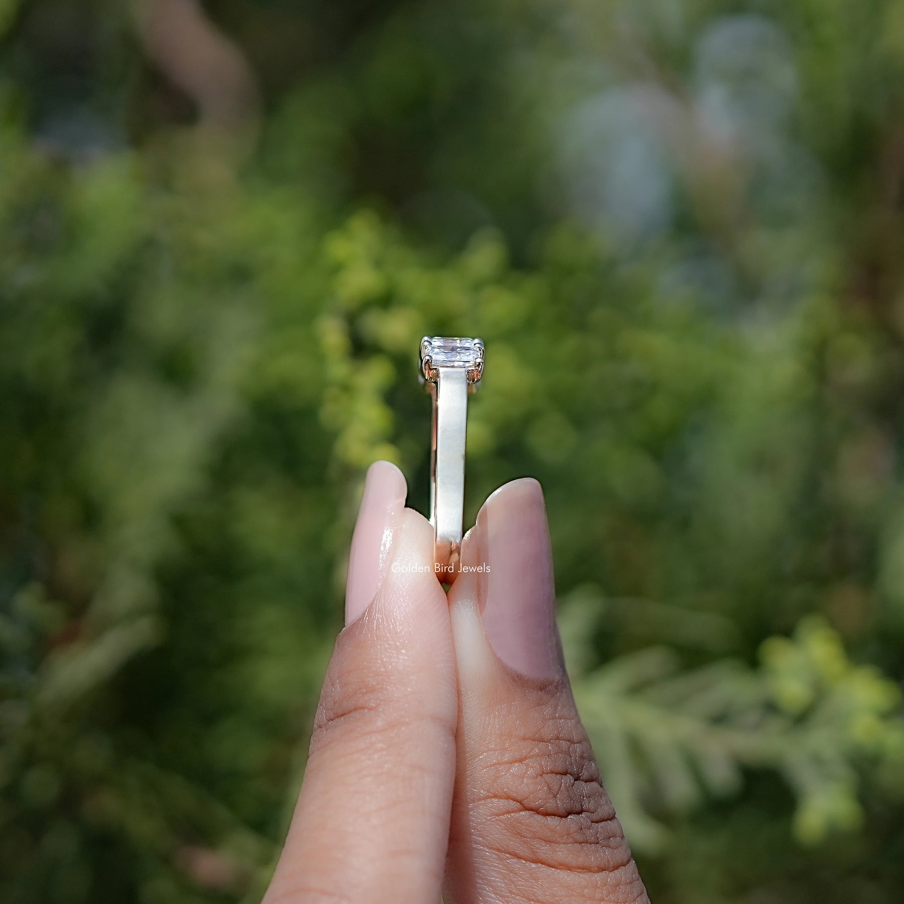 Moissanit-Ring mit fünf Steinen im Radiantschliff