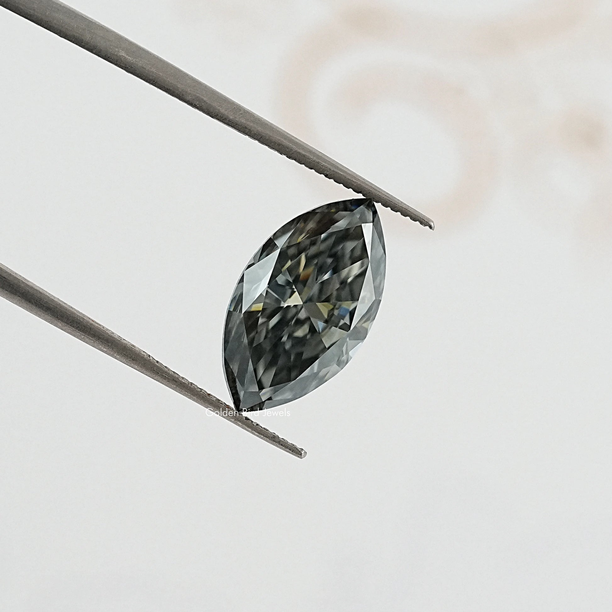 tweezers  View of Marquise Cut Moissanite Loose 