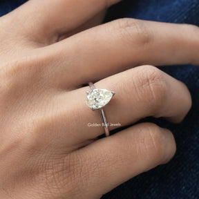 View of Moissanite Pear Cut Solitaire Ring in White Gold