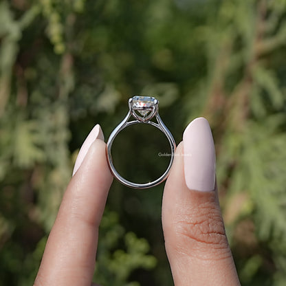 Back view of Old Mine Pear Moissanite Solitaire Ring in secure setting 