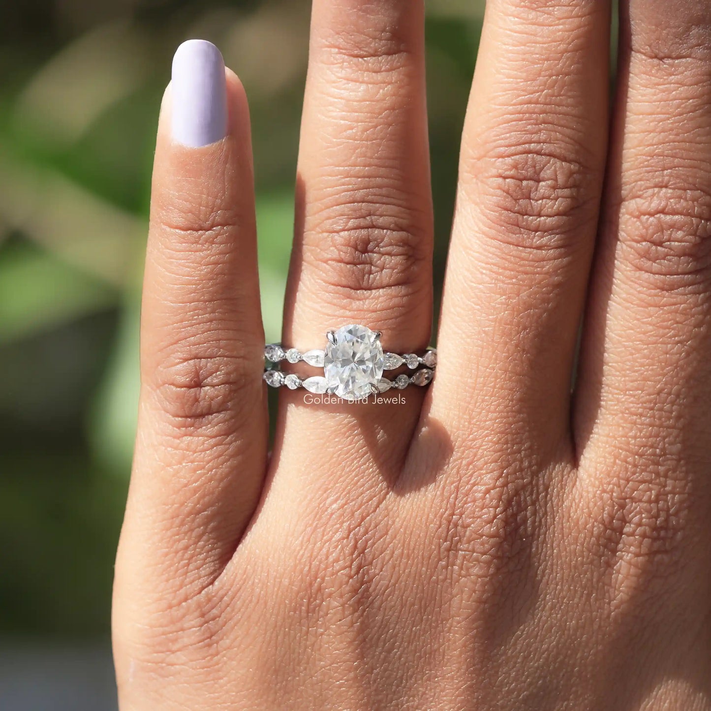 Close-Up View of Oval Cut Moissanite Bridal Ring Set
In White Gold