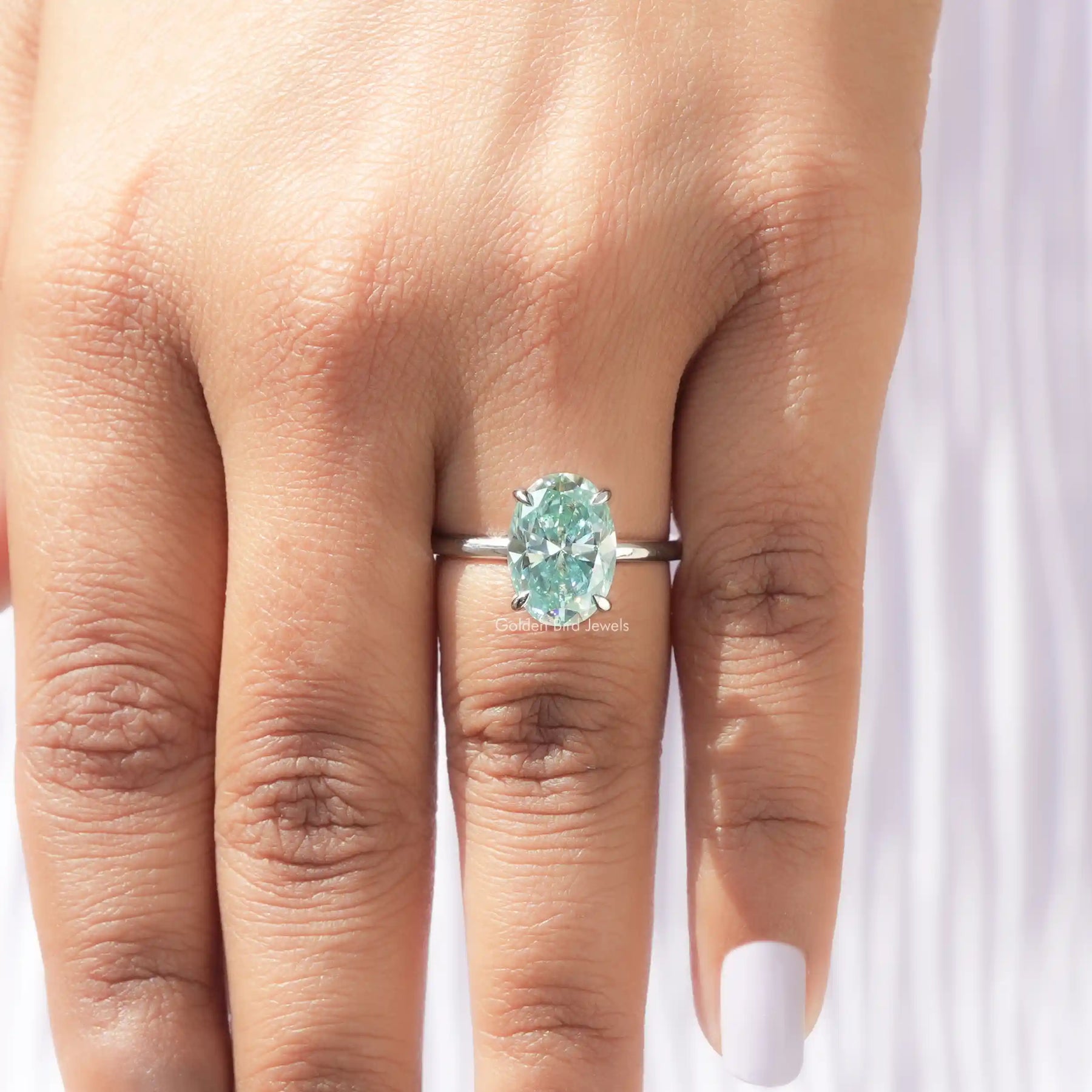 Blue Oval Cut Moissanite Solitaire Ring