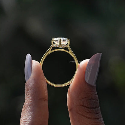 Back View of Cathedral Set Oval Cut Moissanite Ring In two fingers