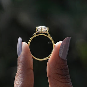 Back View of Cathedral Set Oval Cut Moissanite Ring In two fingers