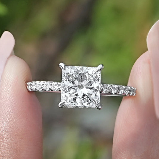 Princess Cut Lab Diamond Solitaire Accent Ring Held Between Fingers