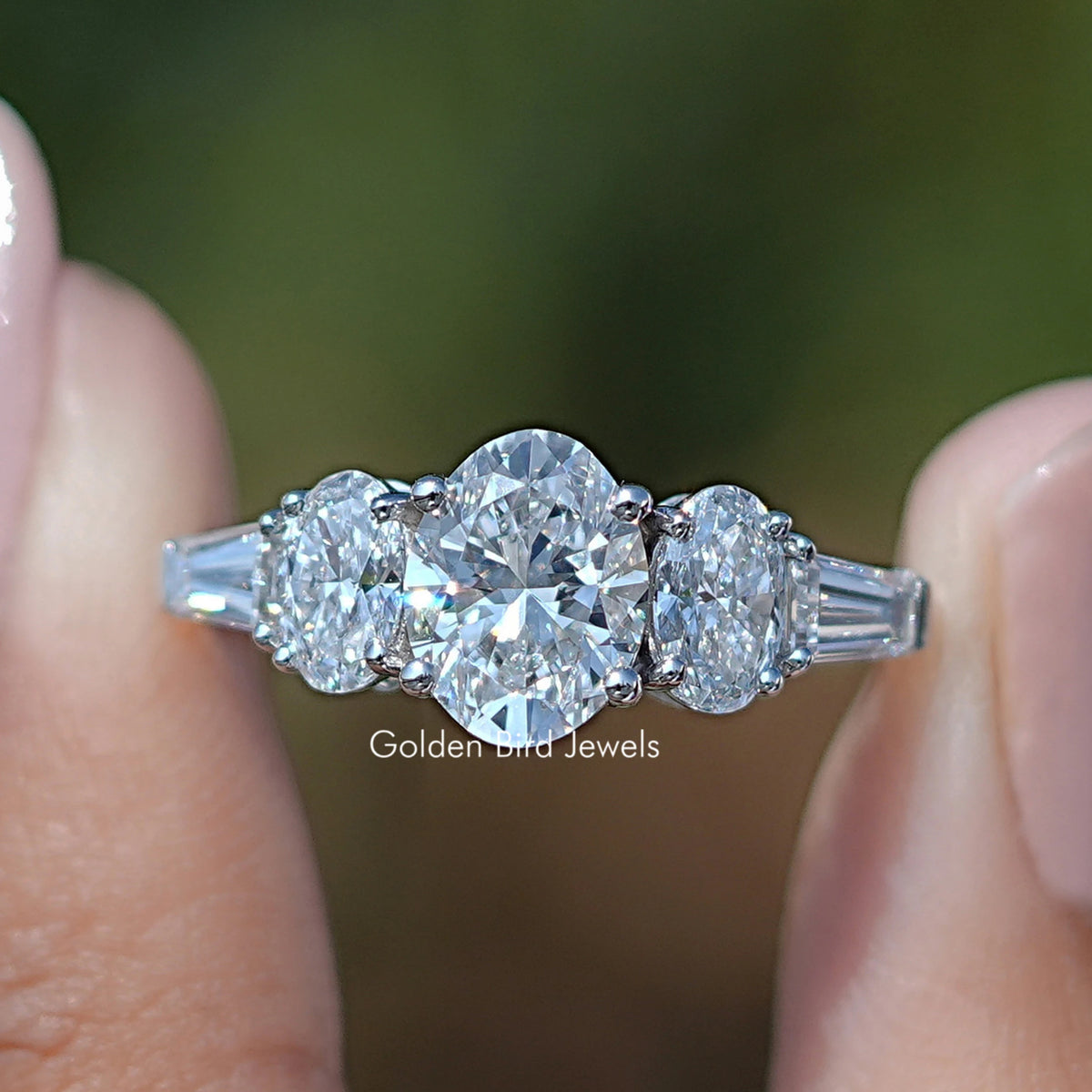 Oval And Tapered Baguette Diamond Five Stone Ring