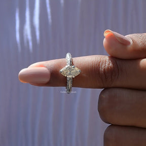 In finger front View of White Moval Cut Moissanite Ring In White Gold
