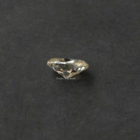 [Side view of off white old mine oval cut moissanite crafted with VVS clarity]-[Golden Bird Jewels]