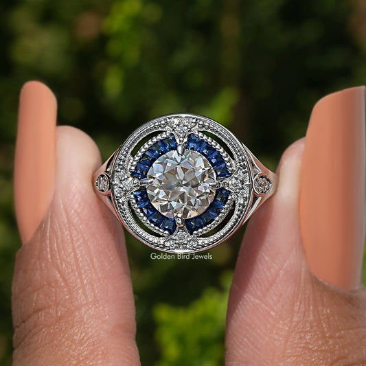 Alter europäischer Halo-Ring mit rundem Schliff und Tapper-Baguette