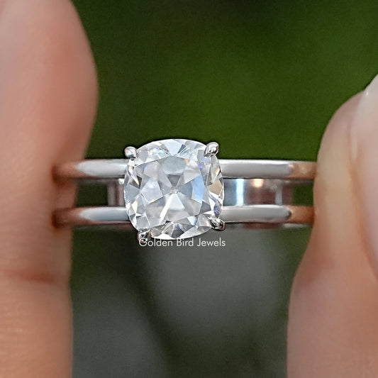 Sterling silver moissanite ring with a cushion-cut center stone and double-row band