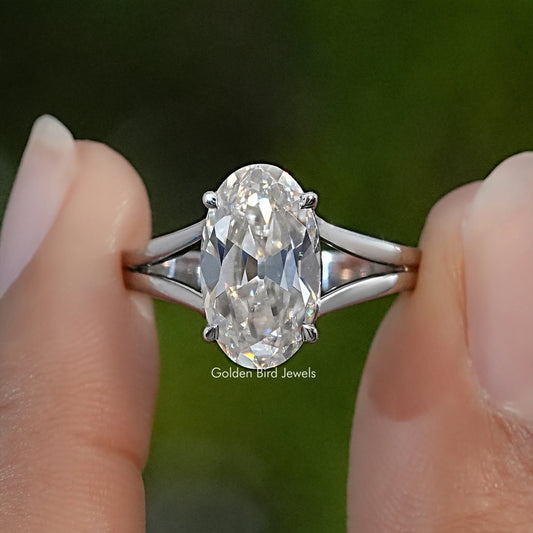 Sterling silver solitaire ring with an elongated oval moissanite and split shank