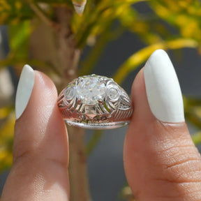 Front View of Old European Round Cut Moissanite Ring In two Fingers