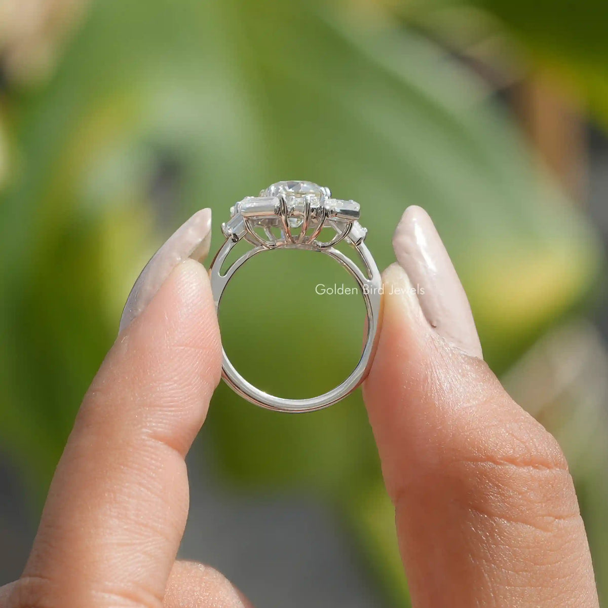 Back View of Old European Round Cut Halo Engagement Ring In two fingers