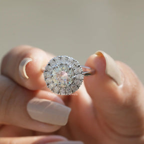 Front View of Old European Round Cut Moissanite Ring In Two Fingers