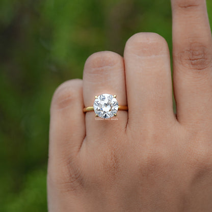 In finger view of Round Cut Solitaire Engagement Ring