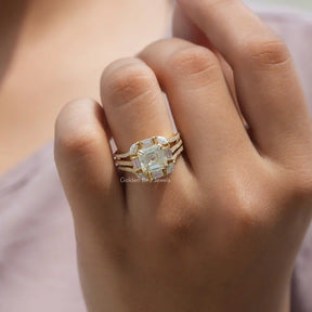 View of Asscher And Baguette Cut Moissanite Ring In Finger