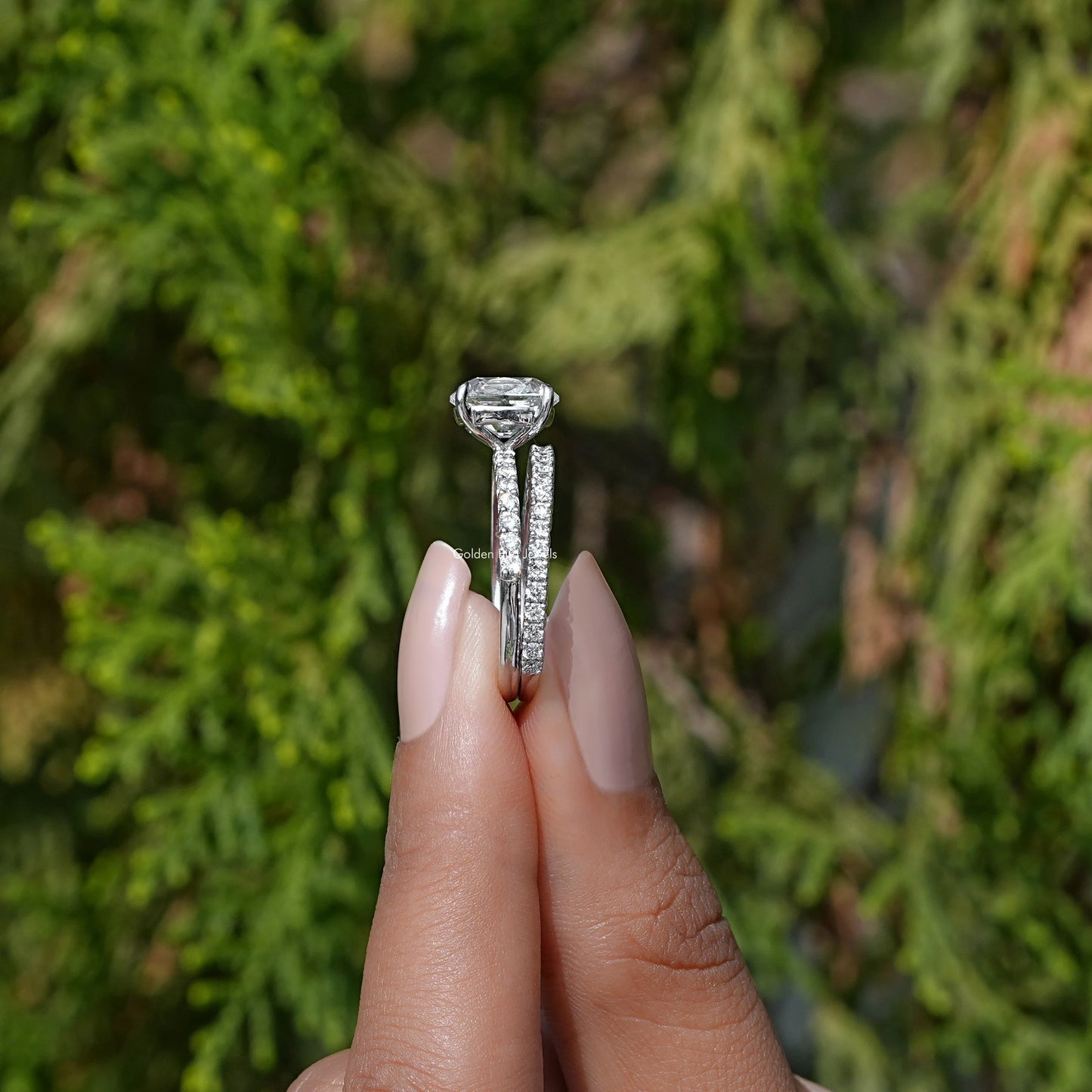 Side View of Lab Diamond Old Mine Cushion Cut Ring Set in two fingers