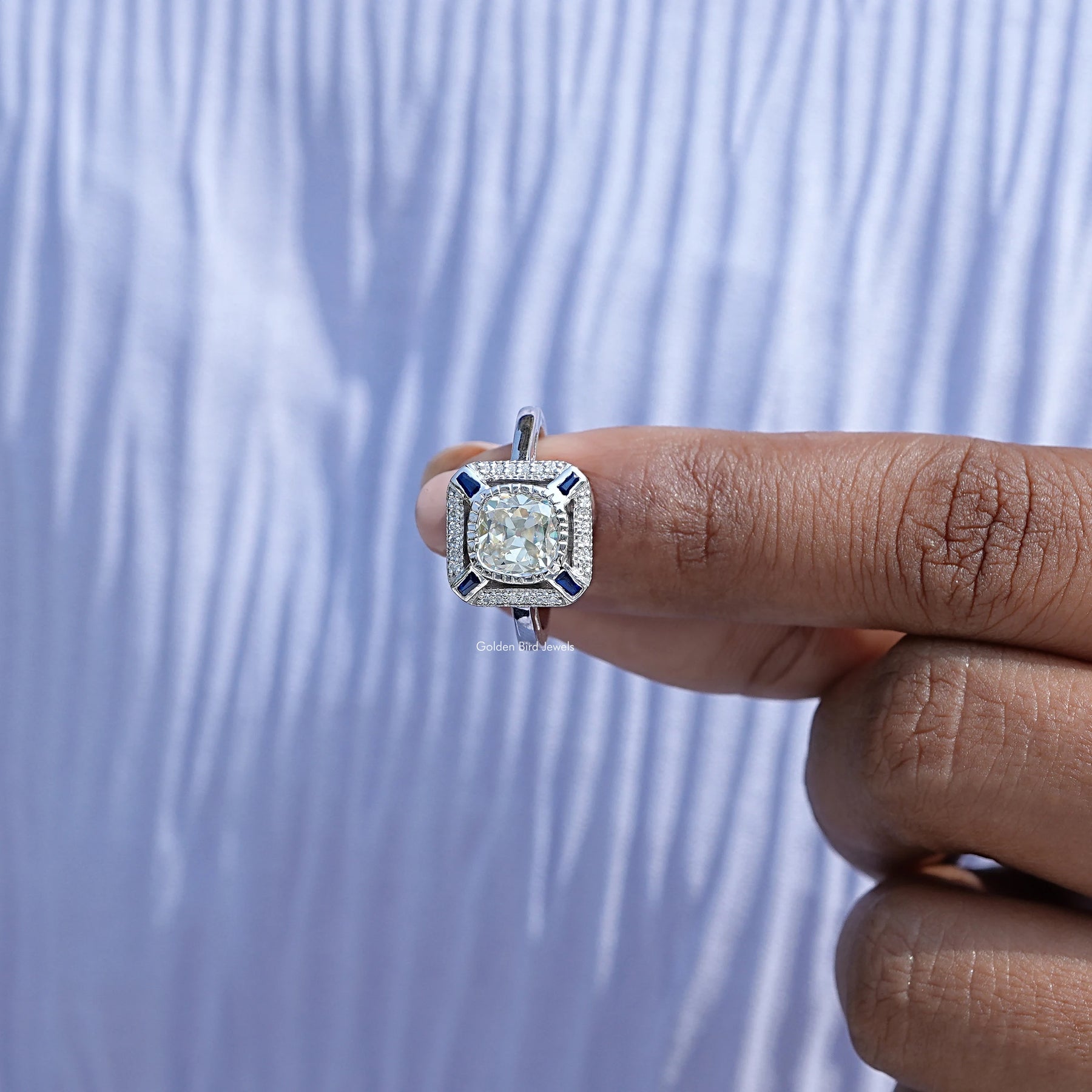 In finger front View of Moissanite Old Mine Cushion Cut Halo Ring In White Gold