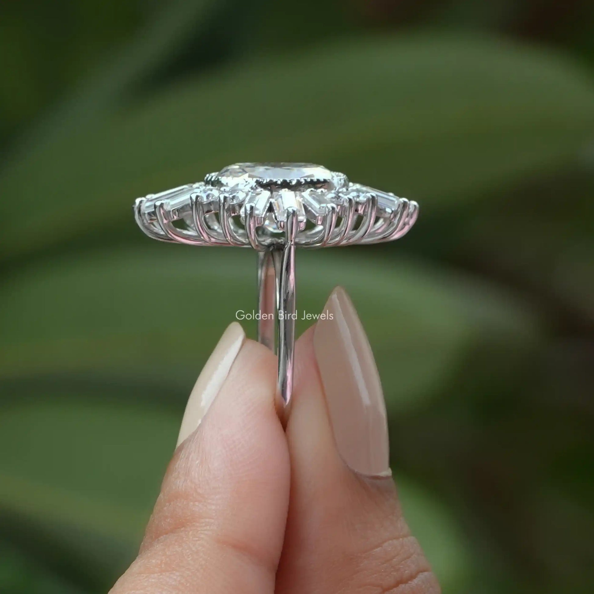 Side View of Old  Cushion Cut Moissanite Engagement Ring In two fingers