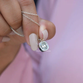 Side view of cushion cut pendant In white Gold
